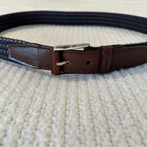 Men’s black and brown woven leather belt.